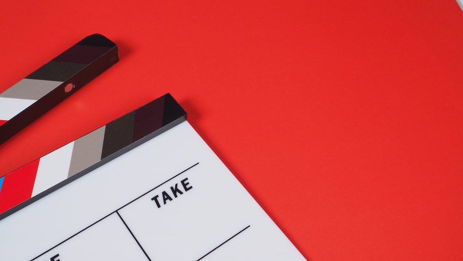 Clapperboard on Red Background 